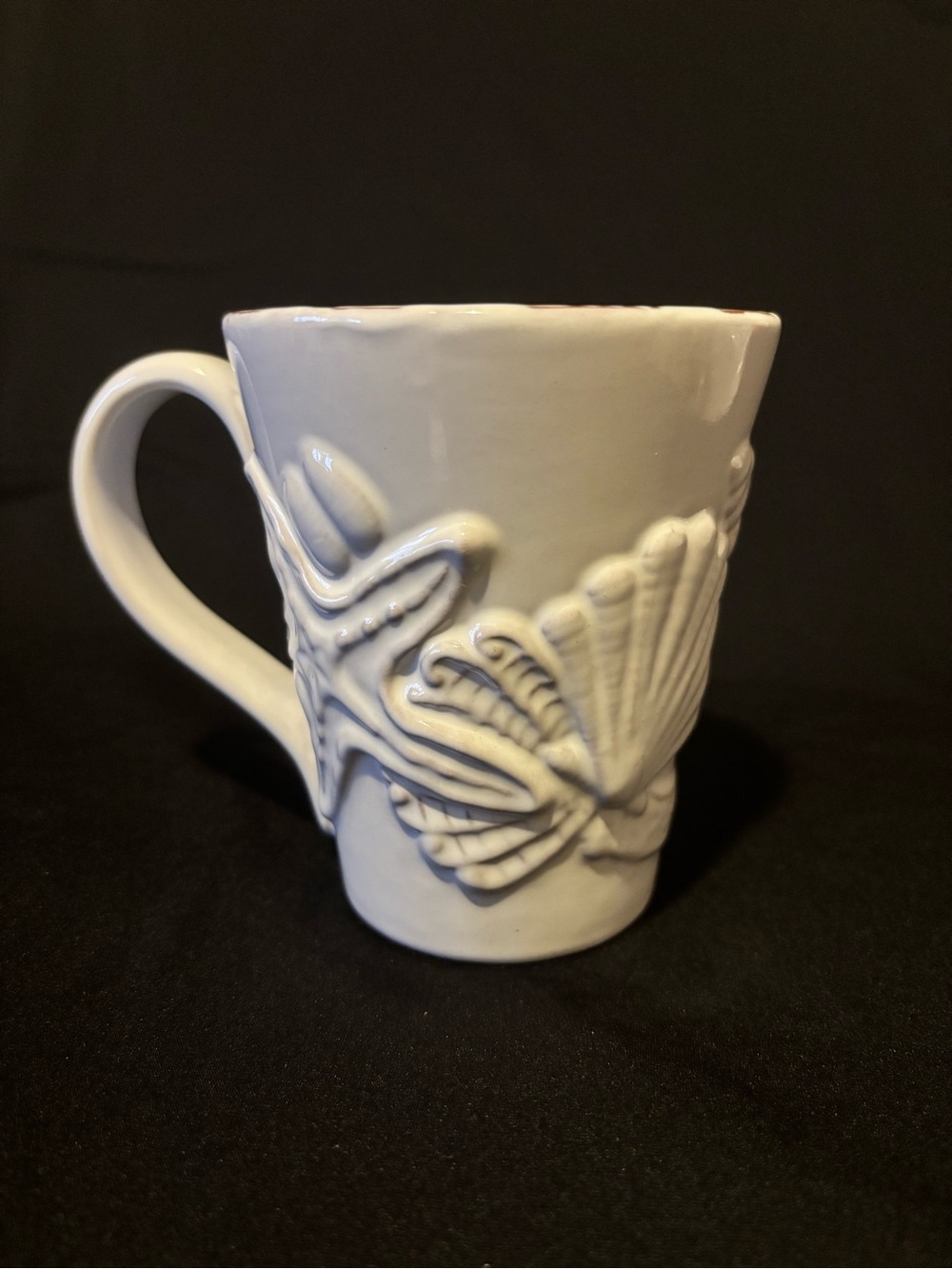 Mud Pie Milk-Glazed Terracotta Embossed Coffee Mug. Seashell and Starfish